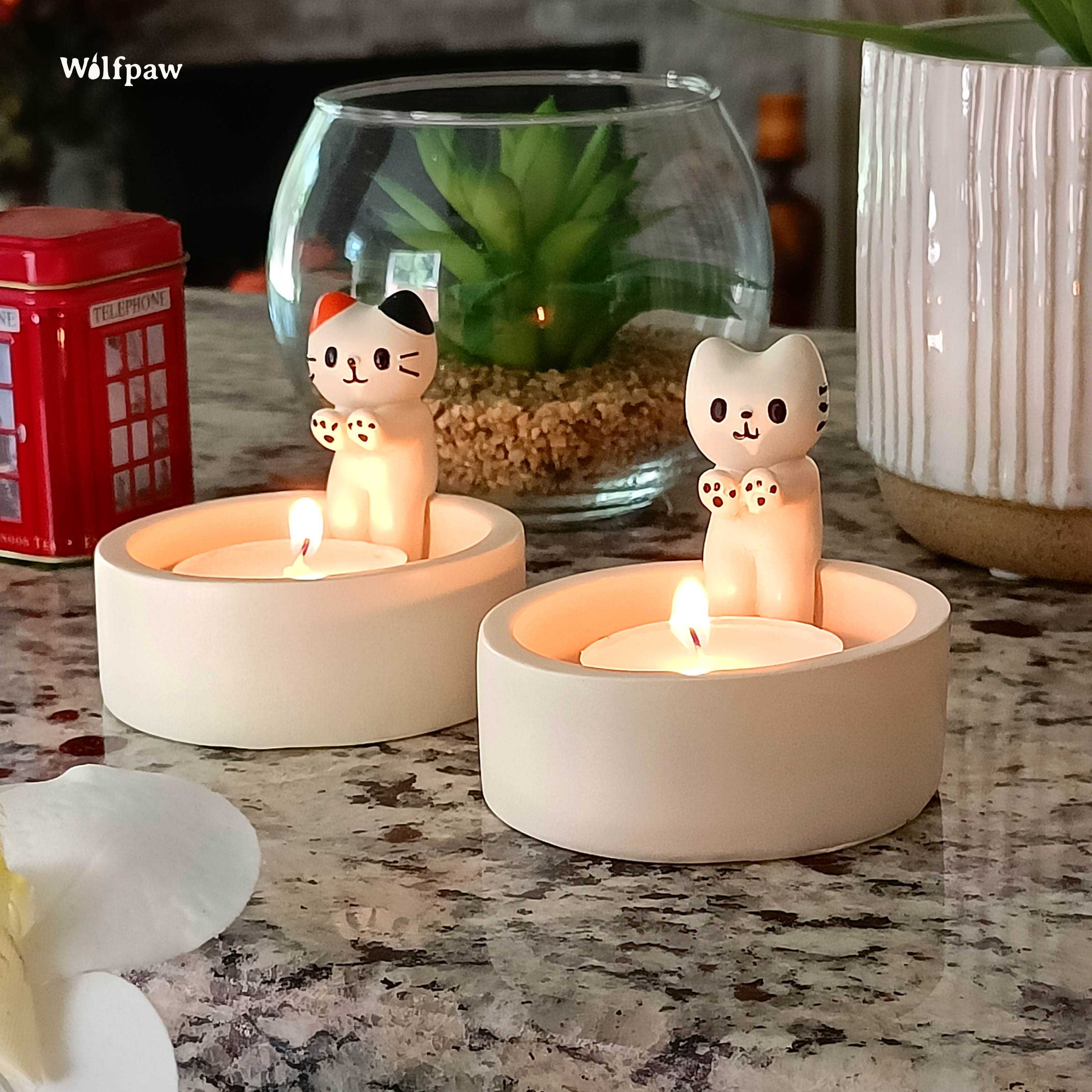 Cute cat candle holder with a small kitten design