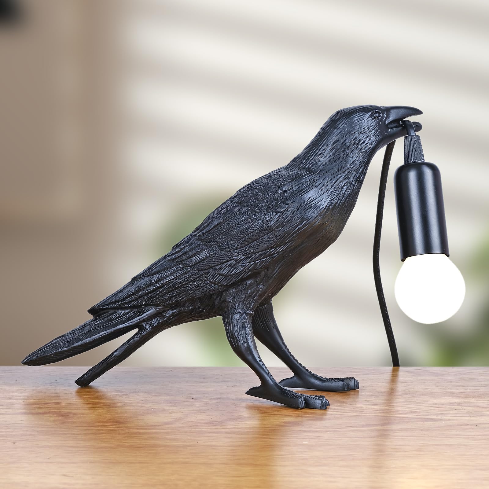 Elegant shot of crow holding a lightbulb looking away from the camera