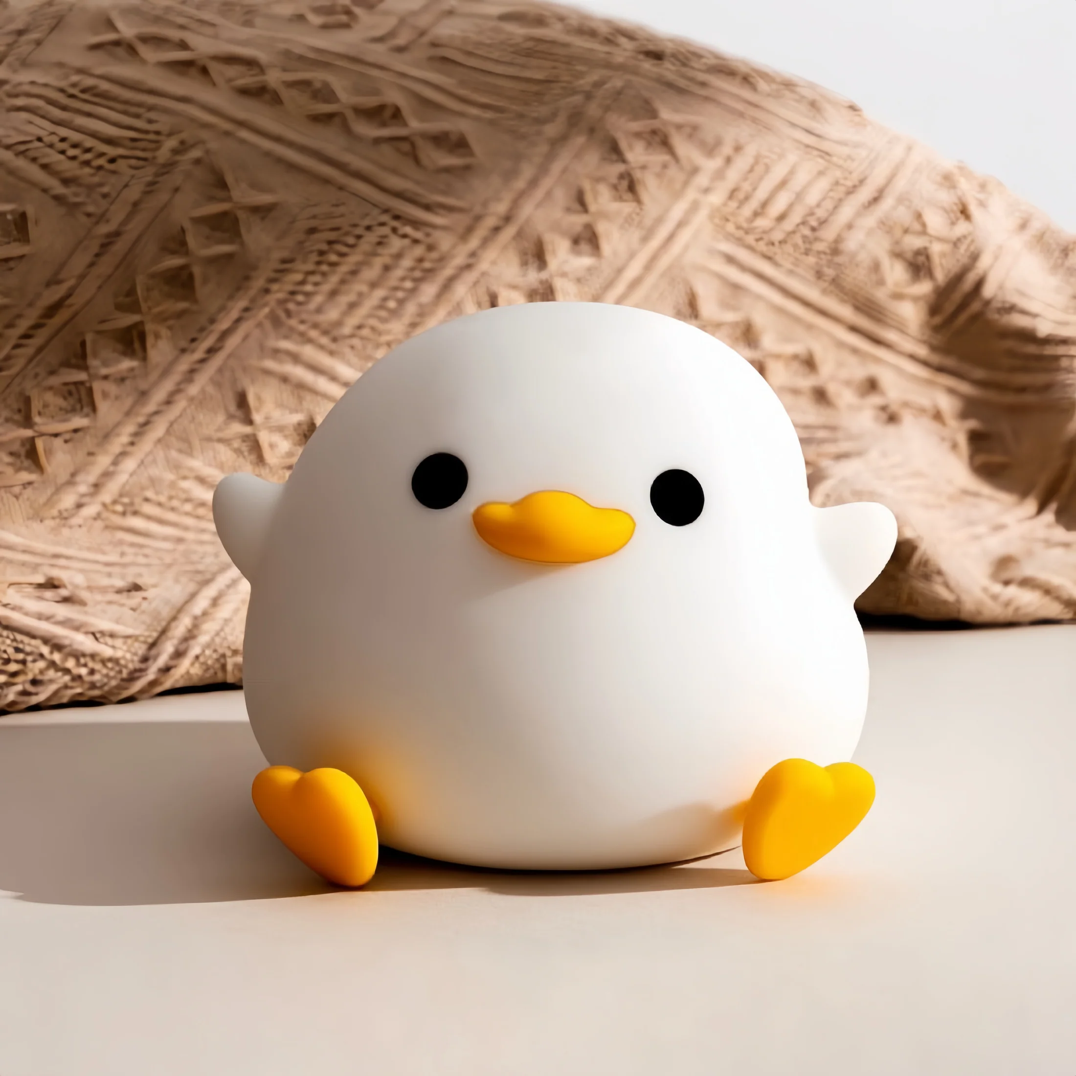 Lifestyle shot of Doudou Duck night light in a cozy bedroom setting