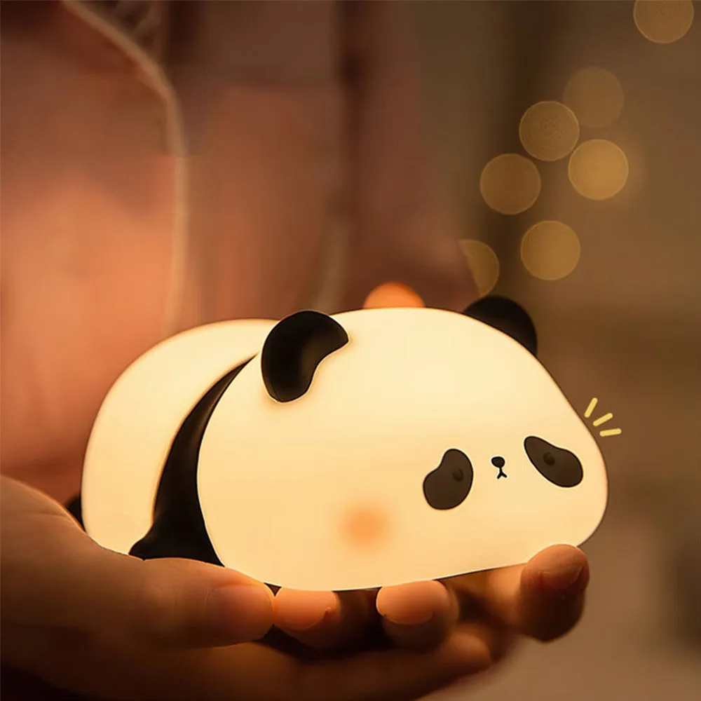 Lifestyle shot of Sleeping Panda night light in a cozy bedroom setting