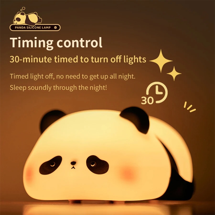 Front view of Sleeping Panda night light on a bedside table